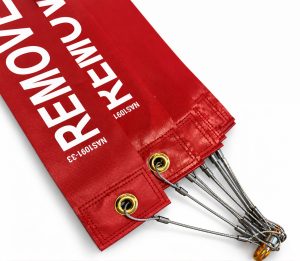 NAS1091 Remove Before Flight streamer assemblies with brass grommets and swaged steel cables